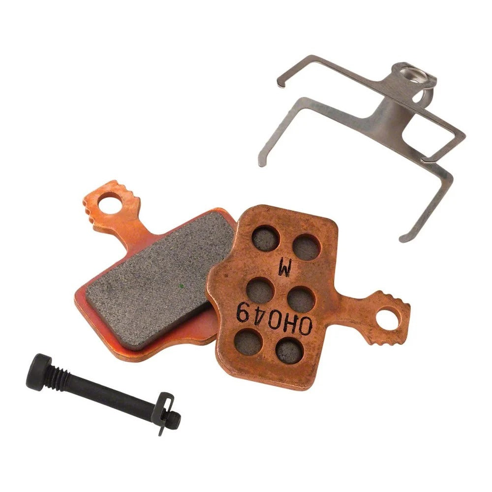 SRAM sintered steel-back disc brake pads for Guide, G2, and Trail calipers with spring and pin, on white background