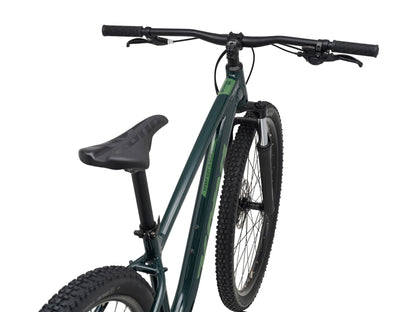 Kona Fire Mountain 2026 hardtail mountain bike in Gloss Emerald green, front three-quarter close-up view of cockpit and fork
