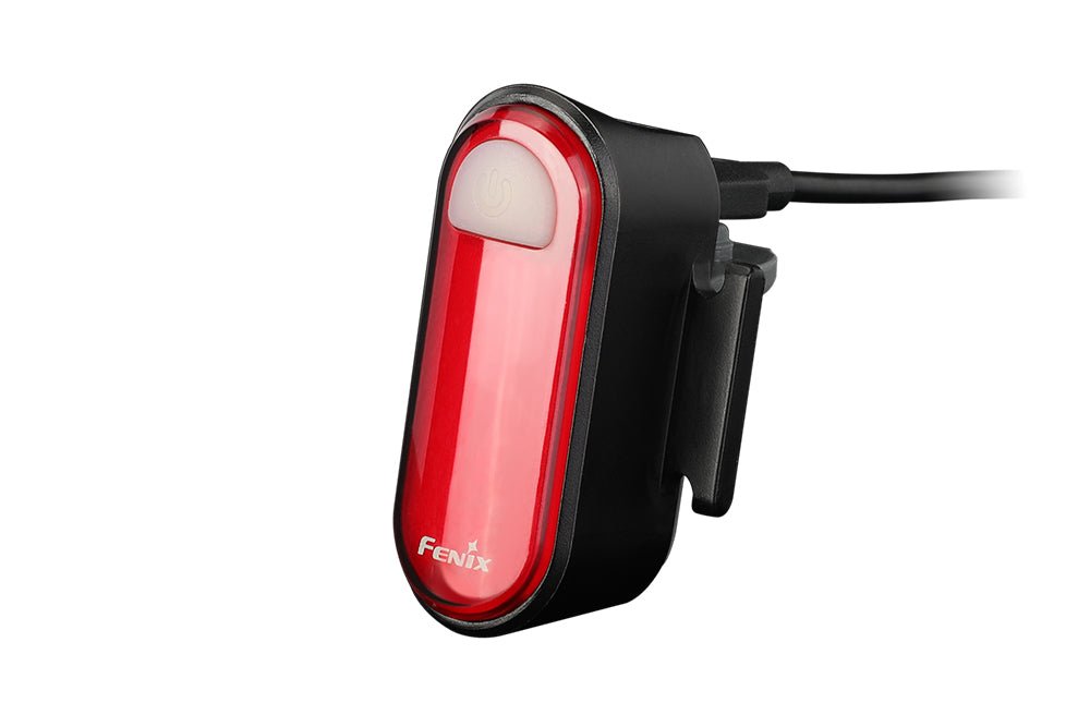 Fenix BC05R V2.0 tail light front-side view showing red lens, power button, Fenix branding, and clip mount, white studio background